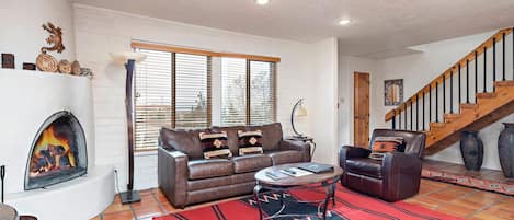 Living Room with Sleeper Sofa and Kiva Fireplace