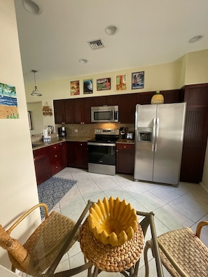 New appliances in kitchen. Well appointed kitchen.
