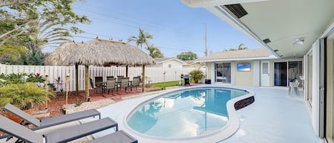 Come Relax in Paradise! 

Our backyard Oasis features a heated Pool & Tiki Hut. 