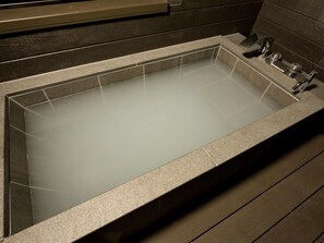 An example of a bath / Milky white artificial hot spring