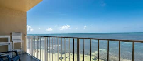 Savor the mesmerizing oceanfront vistas from the serenity of the second-level balcony.