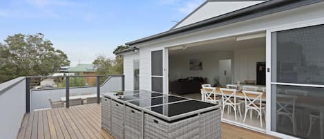 Upstairs spacious deck area with seating available for 12 guests