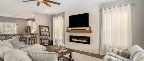 Enjoy Family Movie Night by the Fire in So Heaven`s Spacious Living Room