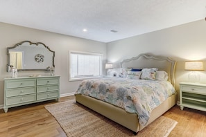 Stunning Master Bedroom with Upholstered Bed and Flat Screen TV