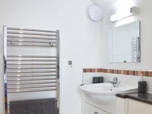 Master bedroom en suite with bath and power shower 