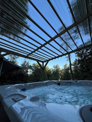 Take in all the mountain, stars & sty views from the 8P SPA hot tub and pergola