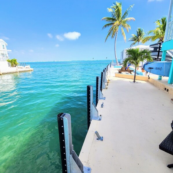 Amazing views from this elevated, like new property! 35' seawall for your boat!