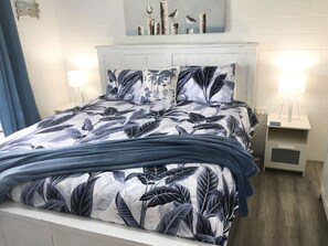 King bed in master bedroom listen to the ocean as you fall asleep