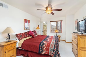 Primary Bedroom with 1 King Bed and Balcony Access