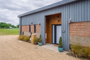 Mandalore; A beautifully converted long barn with private balcony and far reaching views of glorious Suffolk countryside