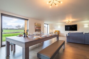 Mandalore, Henham: Dining area with two dining benches which can be swapped for chairs