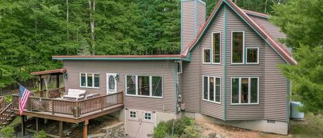 Balconies and Porches and Decks, Oh My! - A roomy porch borders Rustic Retreat, allowing you to make the most of indoor-outdoor living: You can read, eat, grill, and even laze in a hot tub while soaking up the sights and sounds of the mountains.