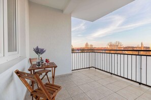 Balcony with garden furniture, where you can take a breath of fresh air.
