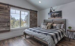 Cast Iron Moose ~ bedroom #3 on upper level w/ King bed and Smart TV