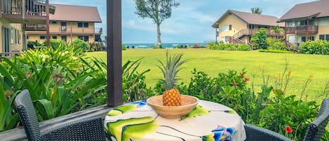 Hanalei Vacation Rentals | Hanalei Colony Resort C2 - Enjoy looking out at the water, just steps away, from your shady and intimate private lanai!