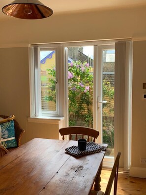 view out dining room window to back garden