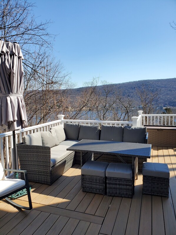 huge dock with a grill and beautiful view of the lake