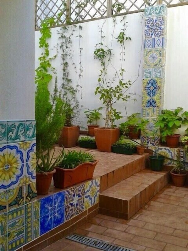 Patio attractively tiled 