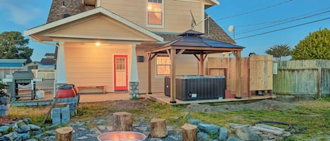 Endless opportunity for fun in this backyard! Enjoy am evening by the fire-pit or soak up the stars from the hot tub.