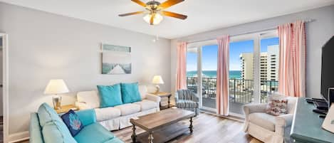 Living Area with Ocean Views, Flat Screen TV, Sleeper Sofa and Private Balcony Access