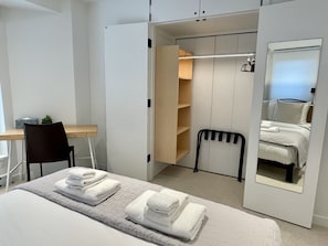 Every bedroom has built in closet organizers & motion activated LED lights