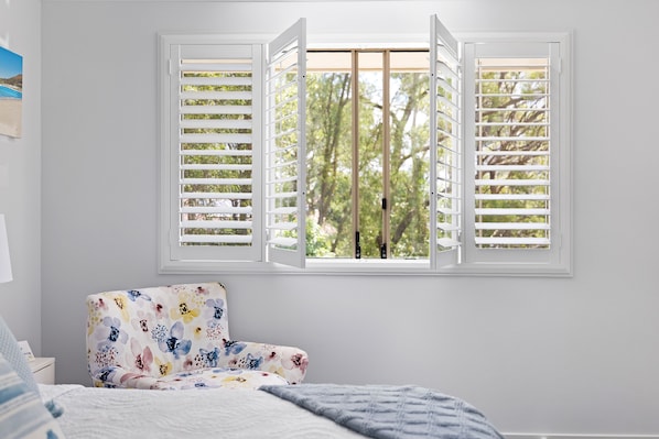 Shutters with view of trees