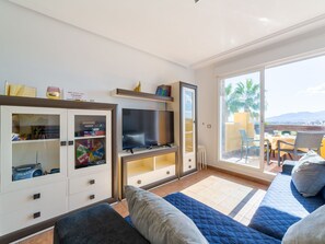 Furniture, Property, Azure, Comfort, Window, Wood, Interior Design, Floor, Building, Living Room