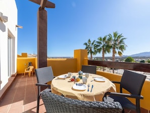 Table, Sky, Furniture, Property, Building, Azure, Chair, Outdoor Furniture, Architecture, Interior Design