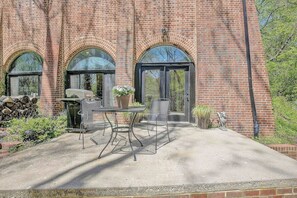 Terrace with seating and gas grill