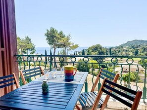 Furniture, Outdoor Furniture, Table, Chair, Outdoor Table, Shade, Eco Hotel, Resort, Kitchen & Dining Room Table, Balcony
