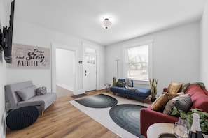Large living room with smart tv and netflix
