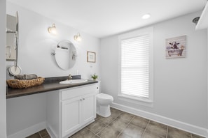 Bathroom has a walk in shower