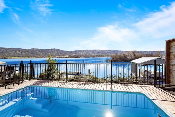 Relax poolside right on the lake! Views are breathtaking!