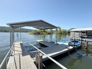 Private covered boat dock with power.  Two pedal boats and kayak for guests 