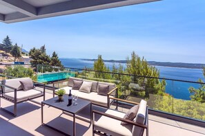 Balcony. Covered lounge corner with amazing sea views, exit from the living room