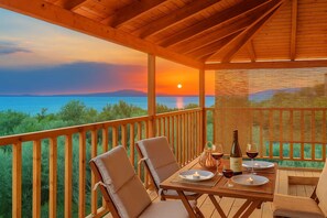 Bask in the soft sunset glow on the studio's balcony
