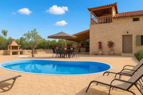 Dive into the inviting ambiance of the swimming pool area