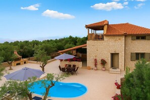Savor the pleasures of the exterior pool area for a truly enjoyable experience
