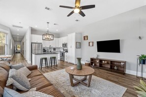 Living room is open to the kitchen