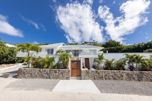 Outdoors: Private parking at the entrance of the property. 