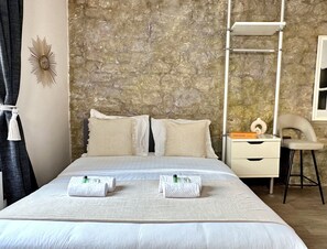 A nice queen size bed with a top quality mattress