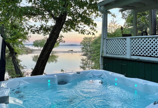 NEW hot tub just installed with a great view of the lake.