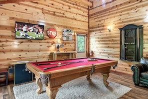 Game Room - Hit your high score on the pool table.