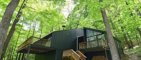 Aerie feels like a treehouse as it's nestled among tall trees on the side of the mountain. Behind Aerie is State Park land. Hike the marked trails and if you're more adventurous, hike to the top!