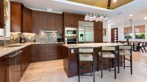 Gourmet kitchen with high end appliances and island seating