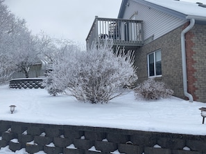 View of handicap ramp and deck for bedroom three