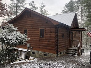 outside of the cabin in the winter