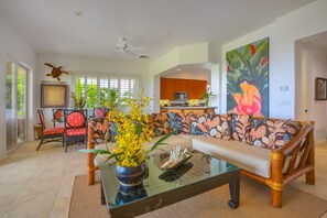 Spacious, comfortable living room. Wonderful views of the golf course and ocean.