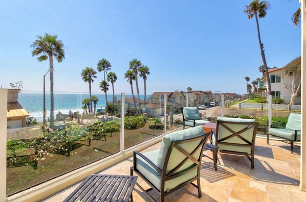 Relax on the front patio, enjoying beautiful sunsets with your family.