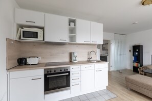 Wohnzimmer mit Küchenzeile